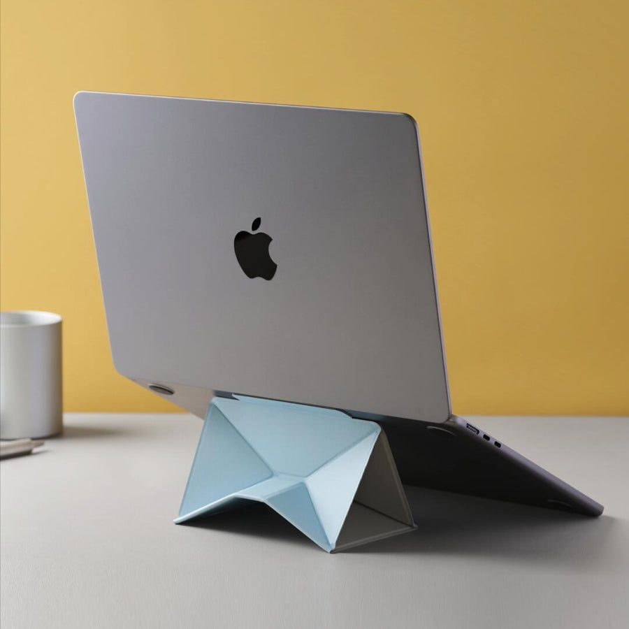 Laptop stand in blue and white supporting a laptop